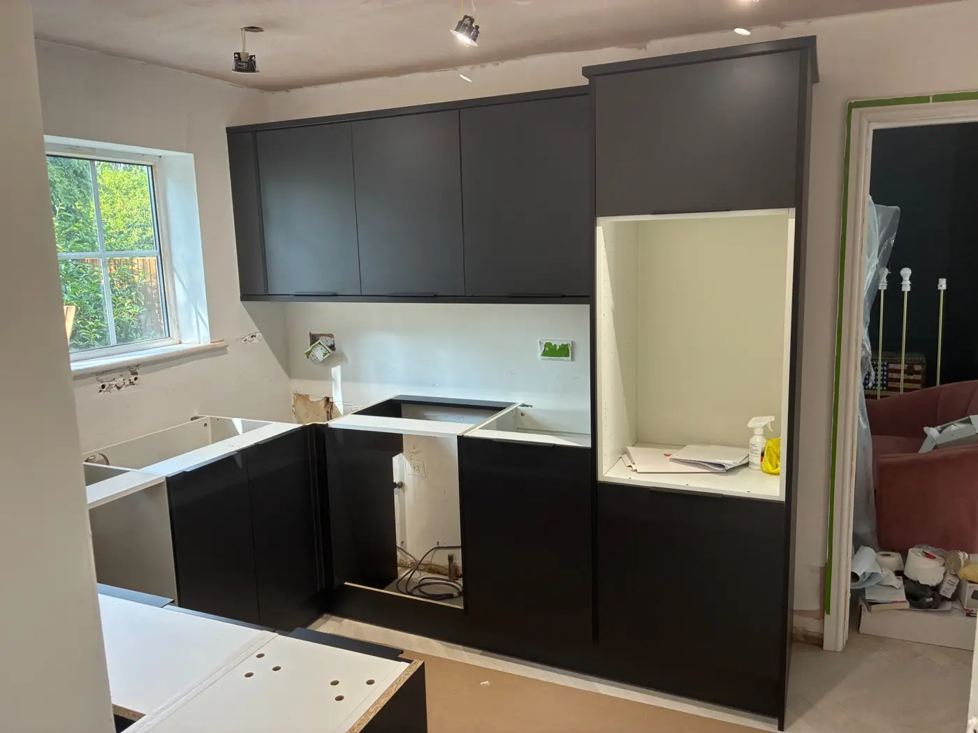 Howdens matt charcoal handleless, mid-fit before the worktops, Welwyn Garden City