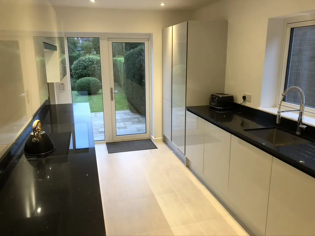 Howdens white gloss handleless galley, Knebworth