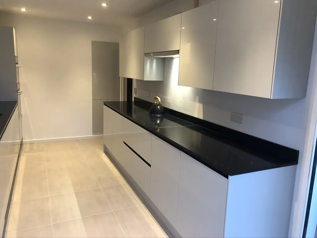 Howdens handleless run with lit extractor housing, Knebworth