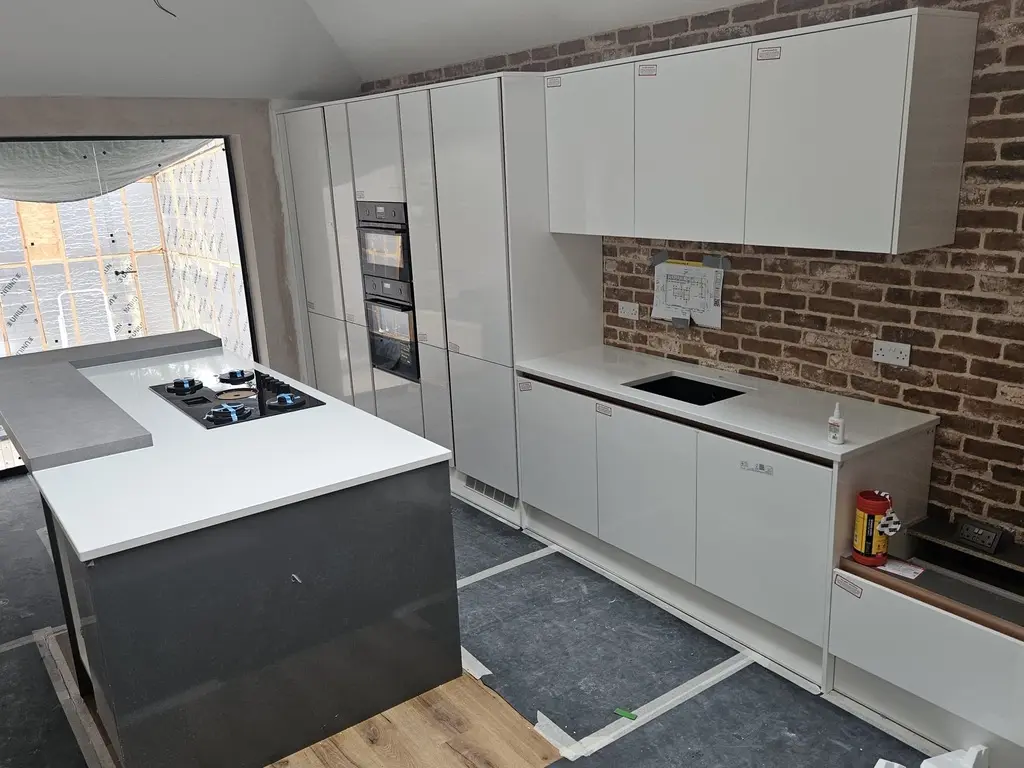 On site: the same kitchen going in, film still on, Letchworth