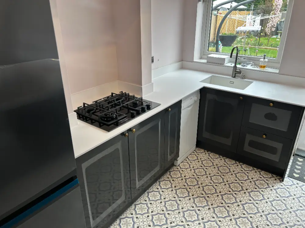 Steve and Julie's navy shaker kitchen, with gas hob and patterned floor, Welwyn Garden City