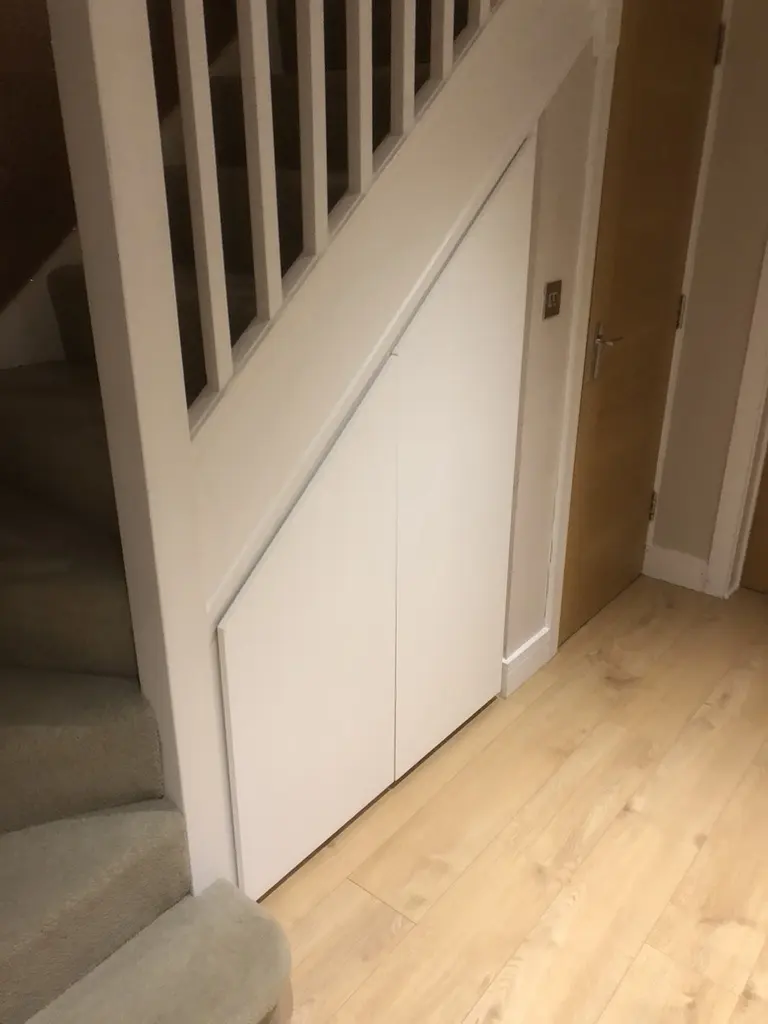 Under-stair storage with flush fronts, Welwyn Garden City
